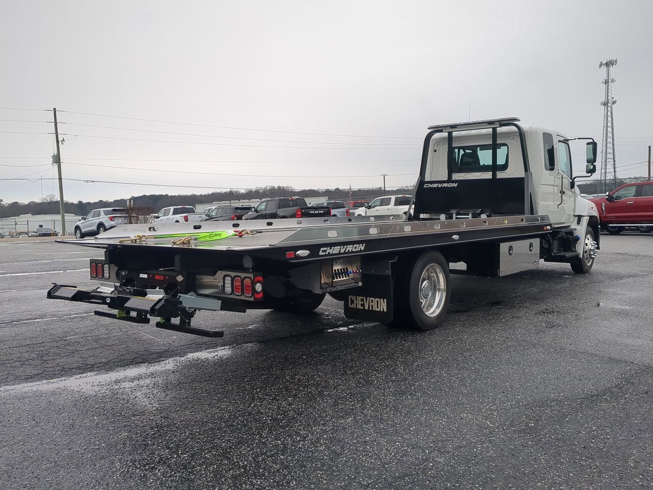 2025 Hino L6 Extended Cab equipped with Chevron 21.5ft LCG Rollback Body Winder GA