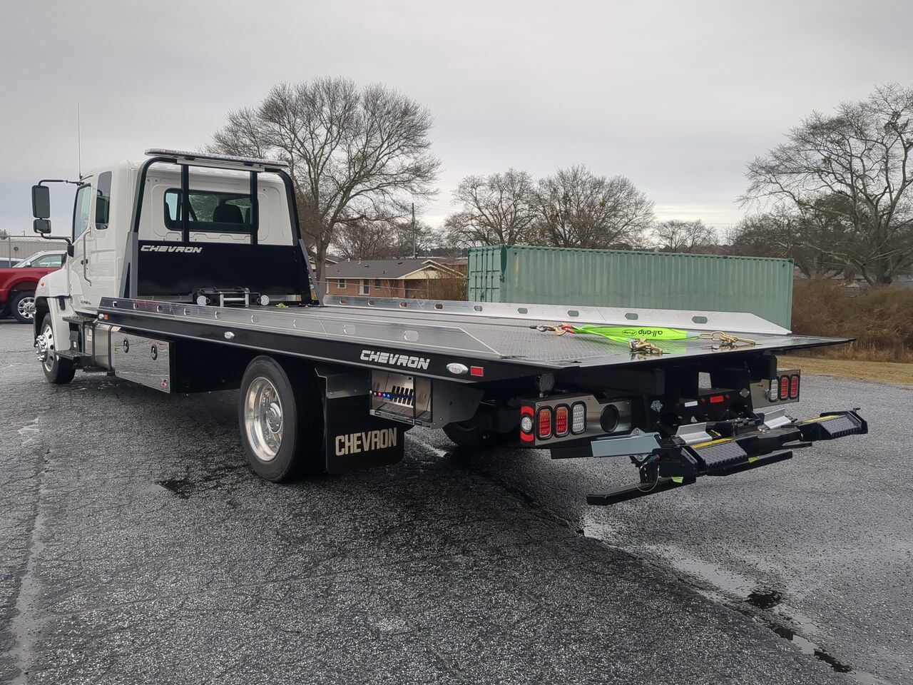 2025 Hino L6 Extended Cab equipped with Chevron 21.5ft LCG Rollback Body Winder GA