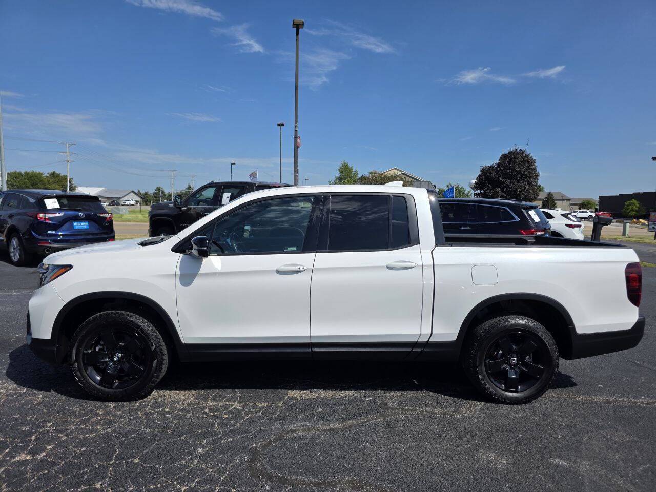 2025 Honda Ridgeline Black Edition AWD 4dr Crew Cab 5.3 ft. SB Eldridge IA