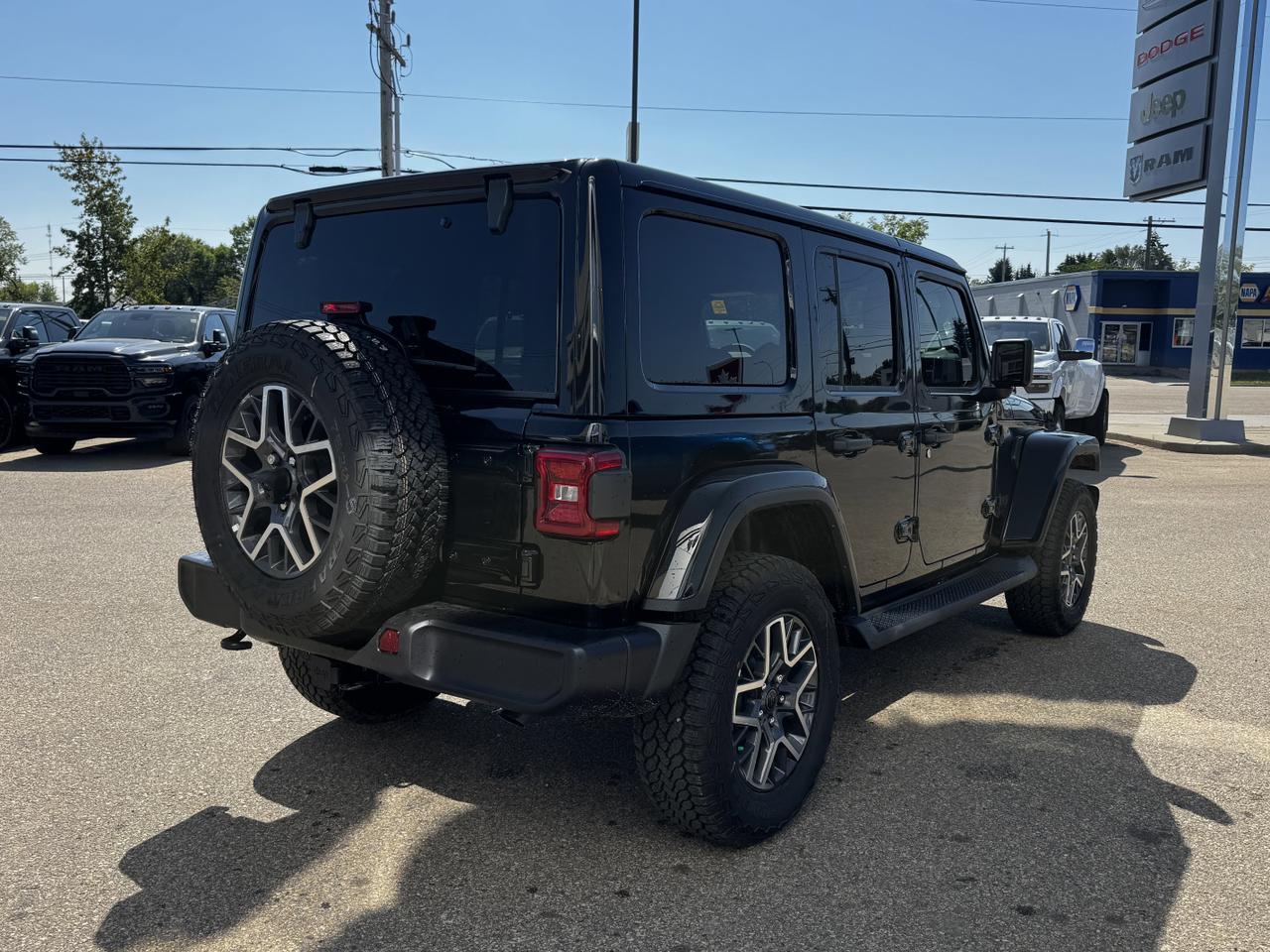 2025 Jeep Wrangler Sahara 4x4 | McKinley Seats | V6 | Remote Start | Backup Camera Redwater AB
