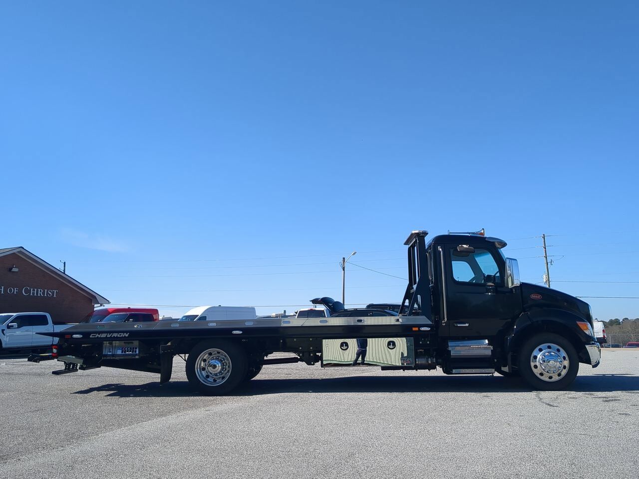 2025 Peterbilt 536 Equipped with Chevron 21.5ft LCG Rollback Body Winder GA