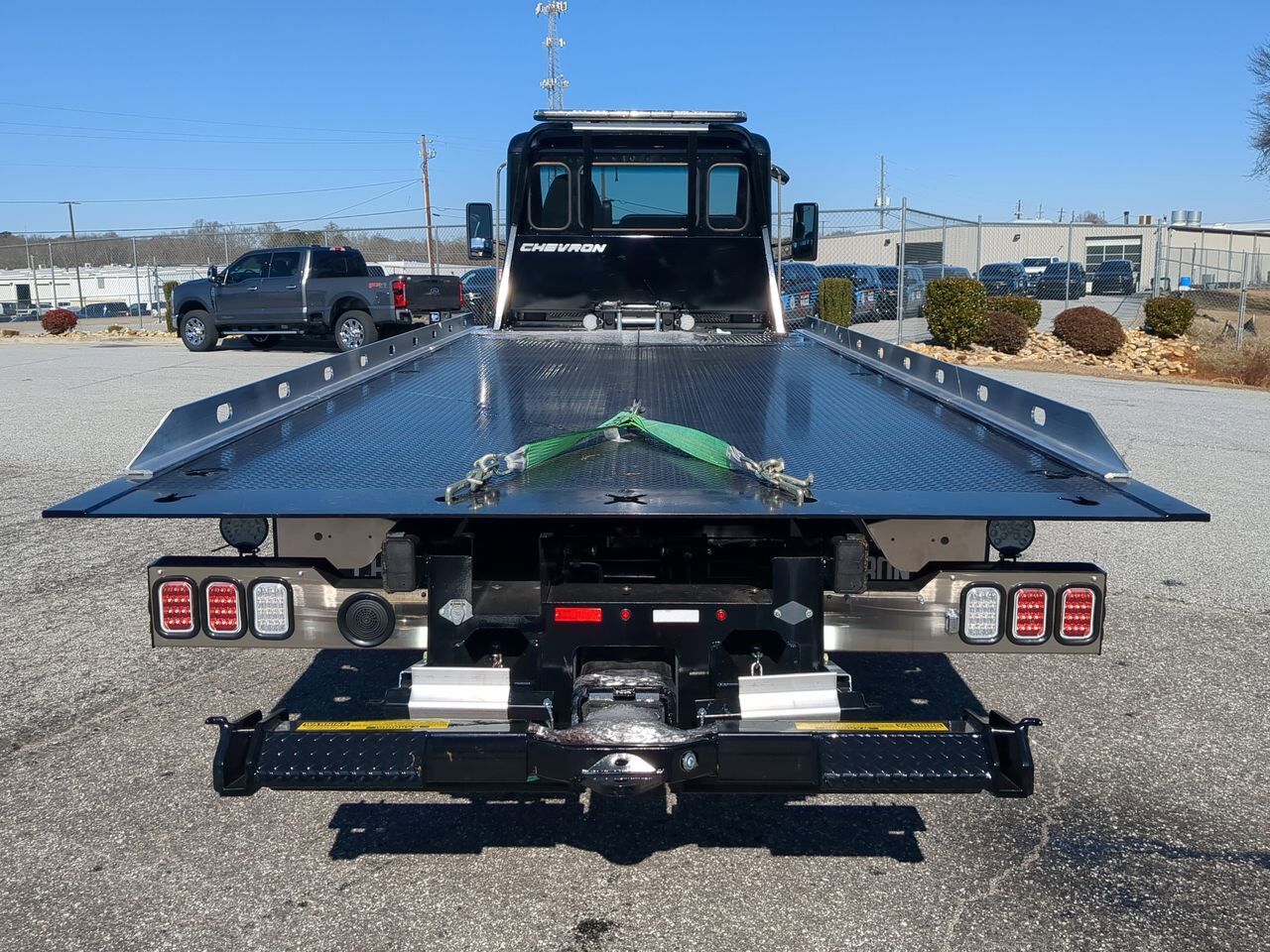 2025 Peterbilt 536 Equipped with Chevron 21.5ft LCG Rollback Body Winder GA