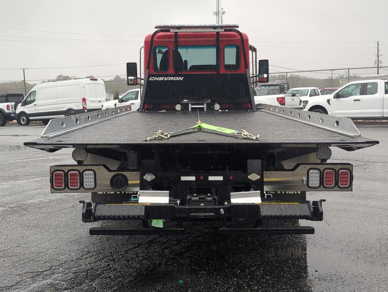 2025 Peterbilt 536 equipped with 21.5ft Chevron LCG Rollback Winder GA