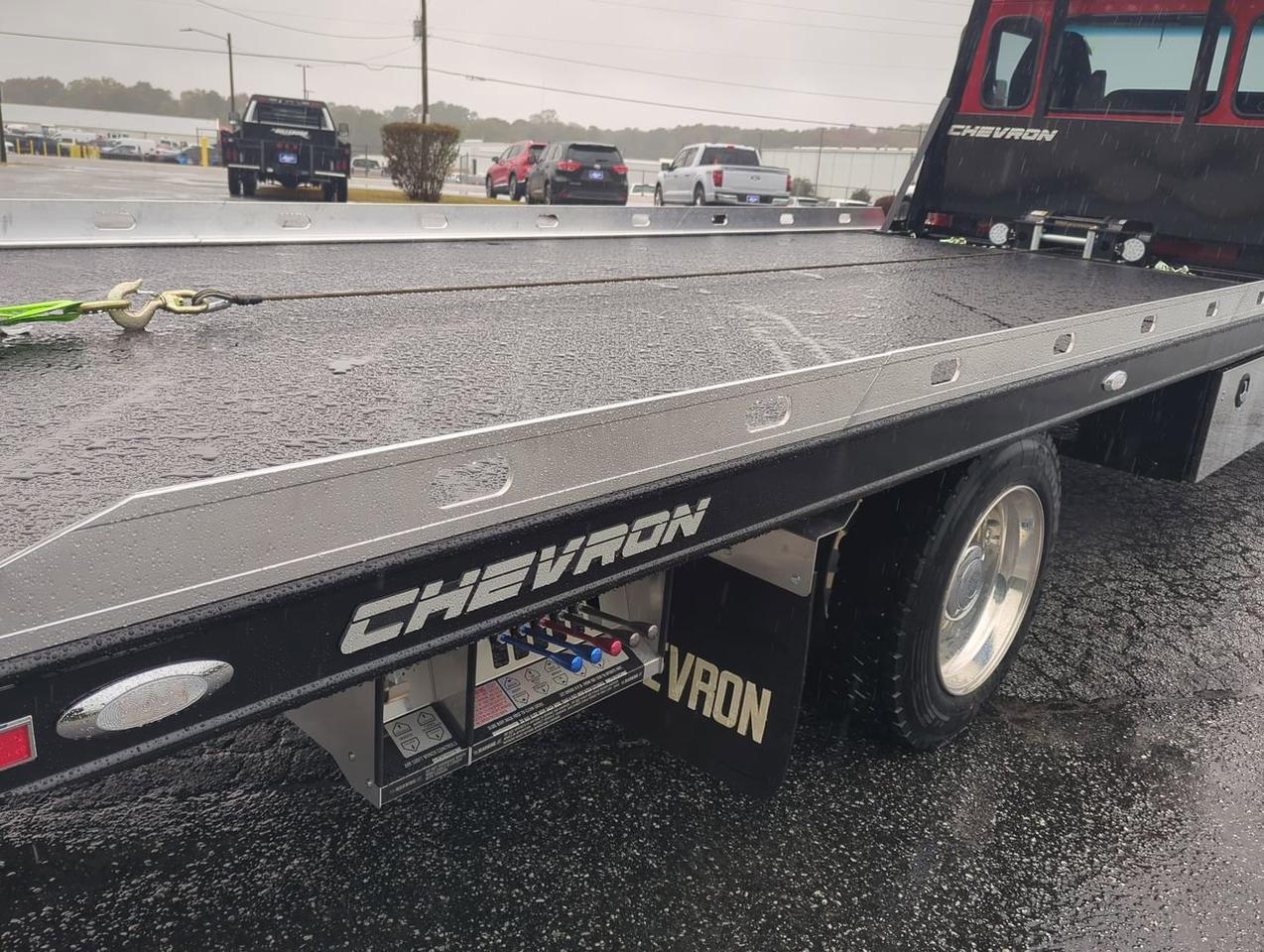 2025 Peterbilt 536 equipped with 21.5ft Chevron LCG Rollback Winder GA