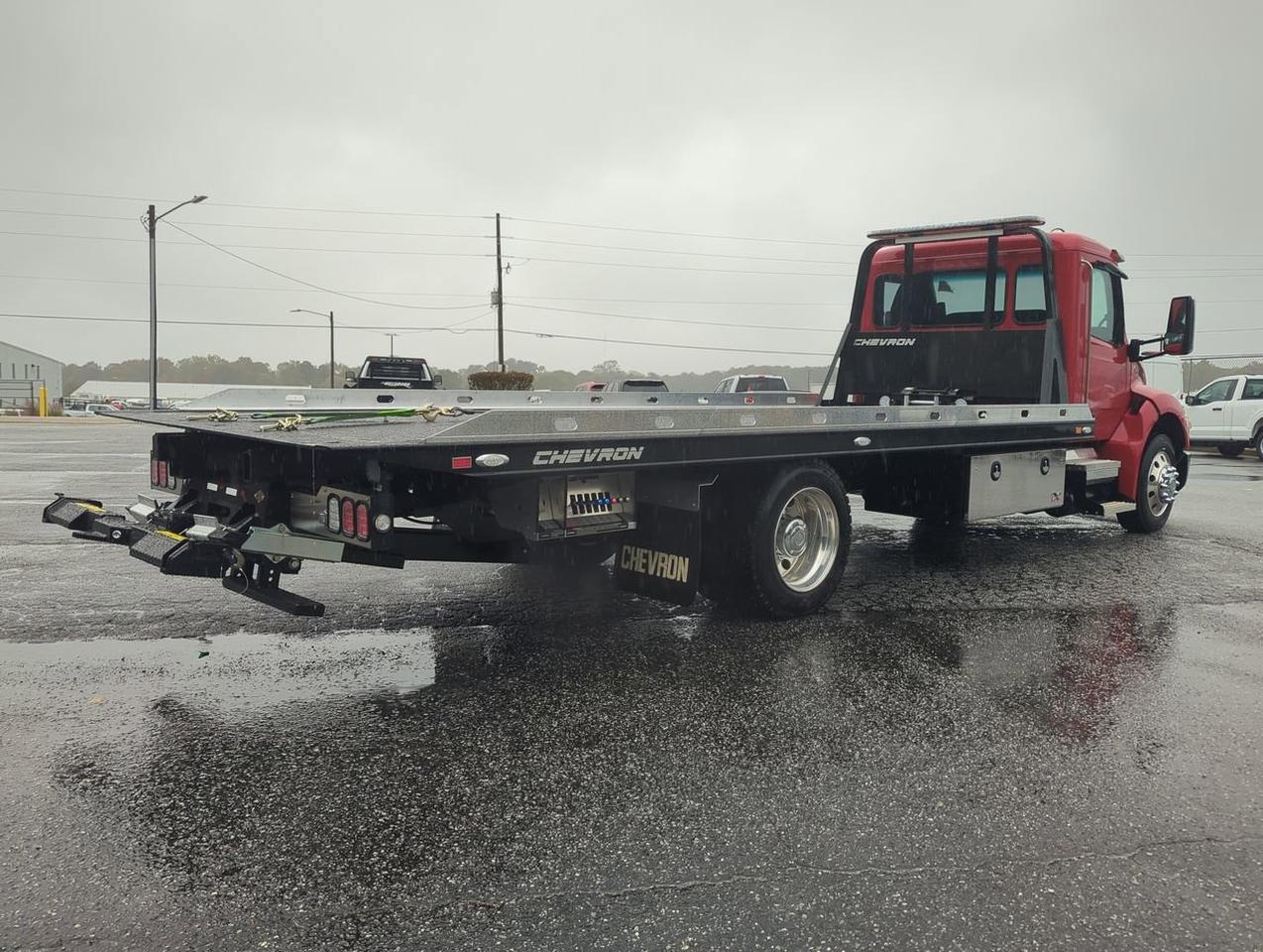 2025 Peterbilt 537 equipped with 21.5ft Chevron LCG Rollback Winder GA
