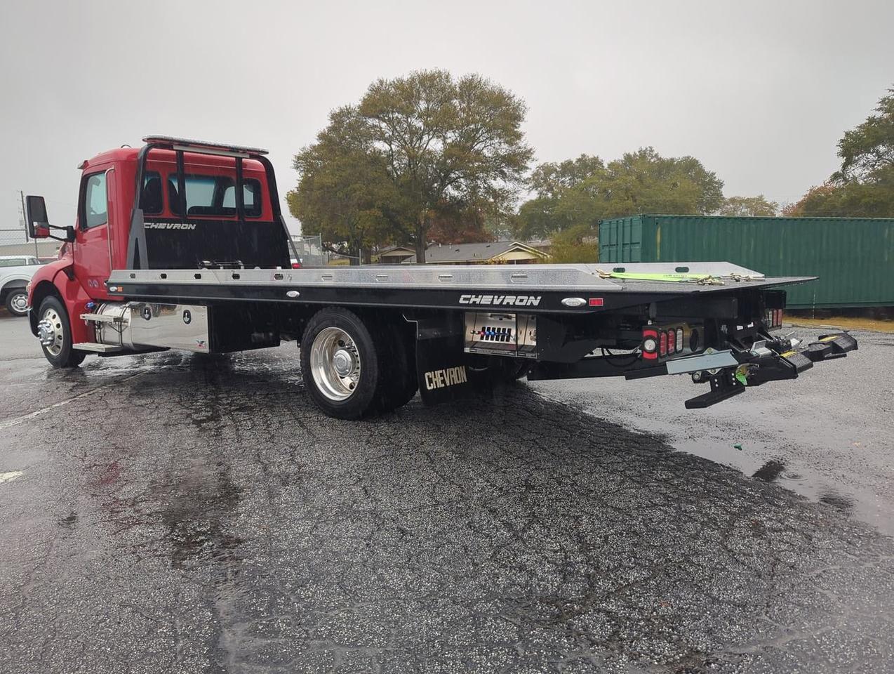 2025 Peterbilt 537 equipped with 21.5ft Chevron LCG Rollback Winder GA