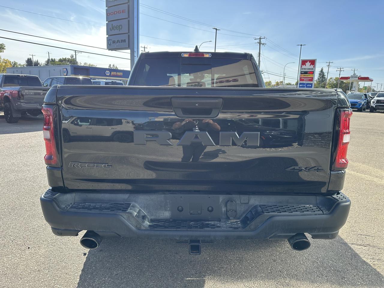 2025 Ram 1500 Rebel Crew Cab 4x4 | Low KMs | 3L Hurricane | Black w Red Inserts | 12IN Display | NAV Redwater AB