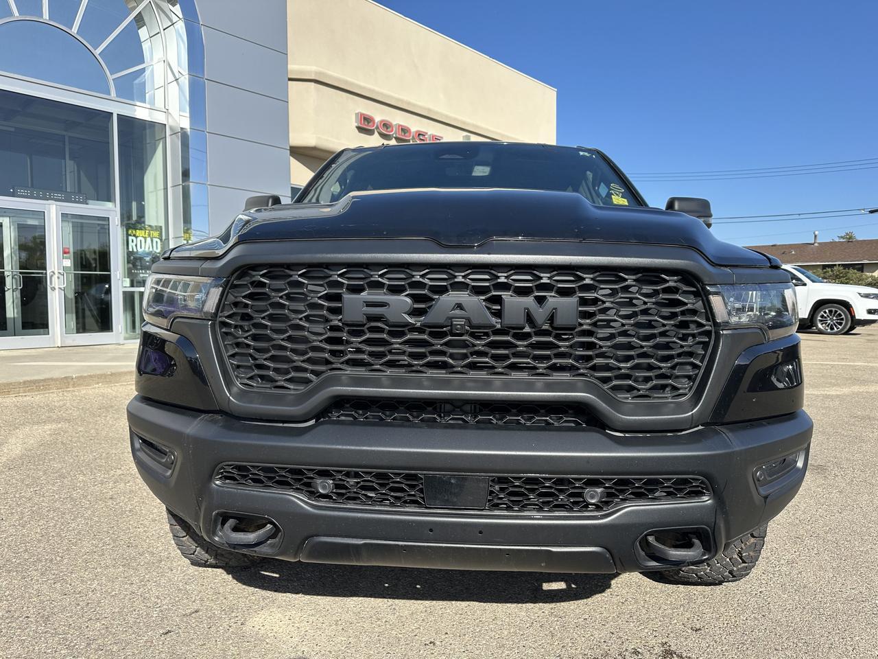 2025 Ram 1500 Rebel Crew Cab 4x4 | Low KMs | 3L Hurricane | Black w Red Inserts | 12IN Display | NAV Redwater AB