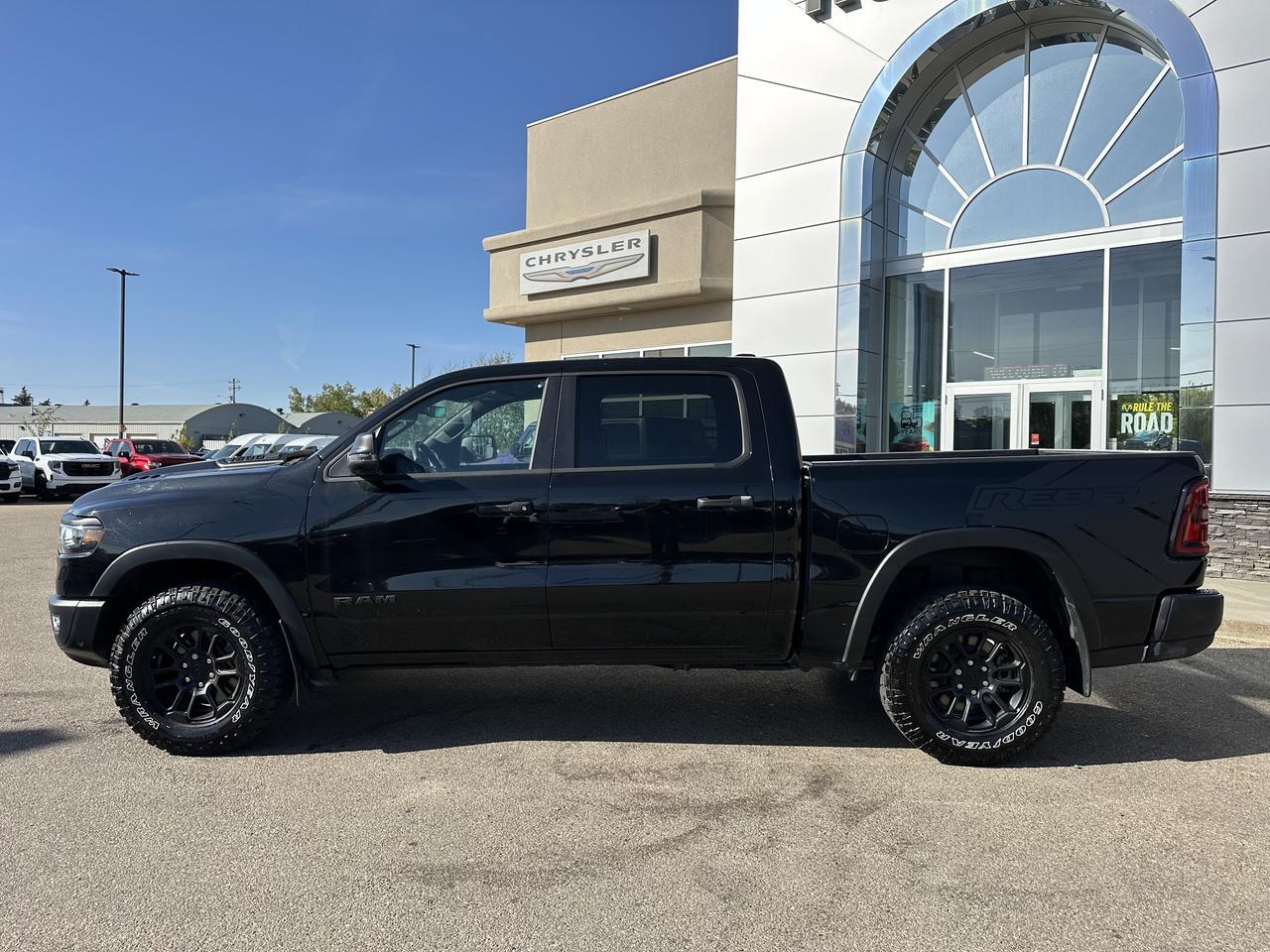 2025 Ram 1500 Rebel Crew Cab 4x4 | Low KMs | 3L Hurricane | Black w Red Inserts | 12IN Display | NAV Redwater AB