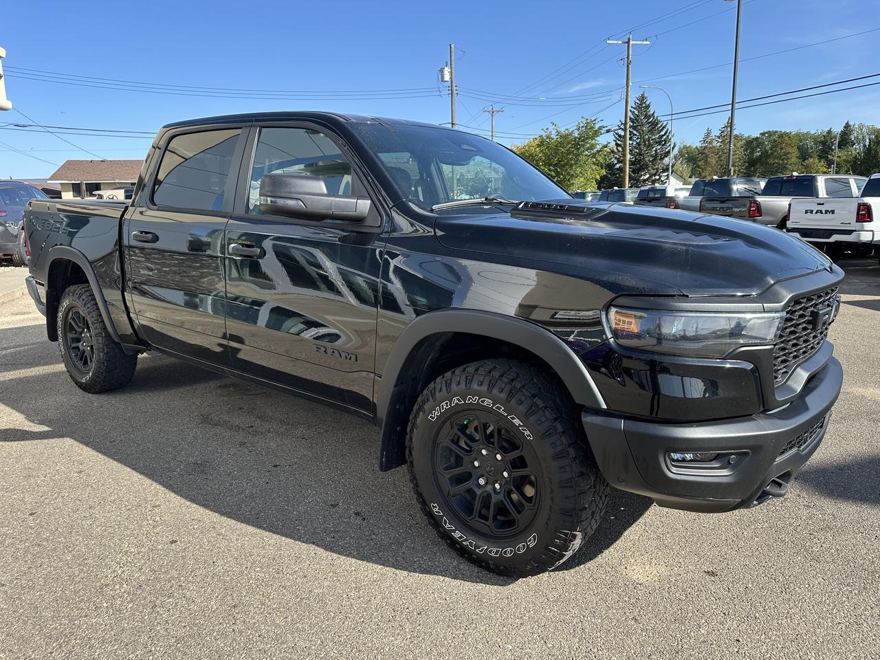 2025 Ram 1500 Rebel Crew Cab 4x4 | Low KMs | 3L Hurricane | Black w Red Inserts | 12IN Display | NAV Redwater AB