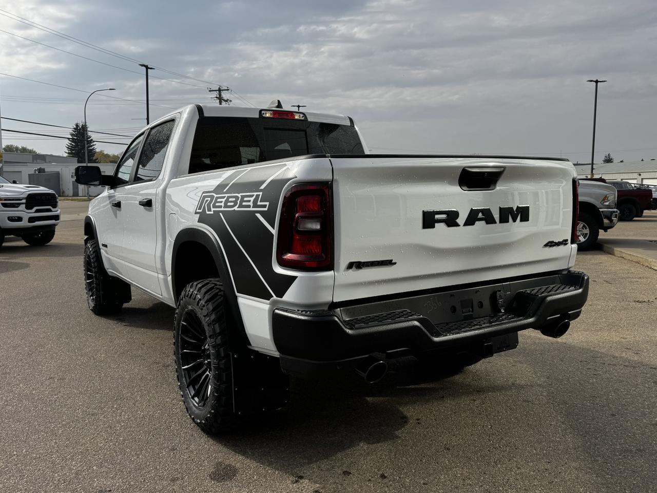 2025 Ram 1500 Rebel Crew Cab 4x4 | MILK MAN |  Rig Ready Ram | 3L Hurricane | Cloth Vinyl | Red Inserts Redwater AB