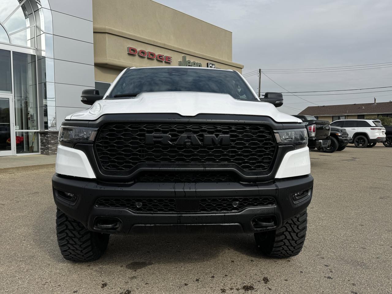 2025 Ram 1500 Rebel Crew Cab 4x4 | MILK MAN |  Rig Ready Ram | 3L Hurricane | Cloth Vinyl | Red Inserts Redwater AB