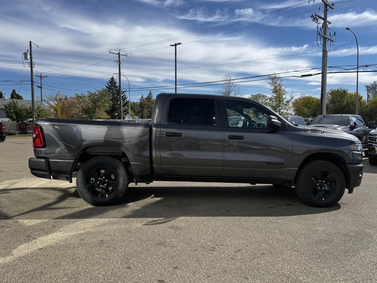 2025 Ram 1500 Tradesman Night Edition Crew Cab 4x4 | 3L Hurricane | Front Cloth Bench | Backup Camera Redwater AB