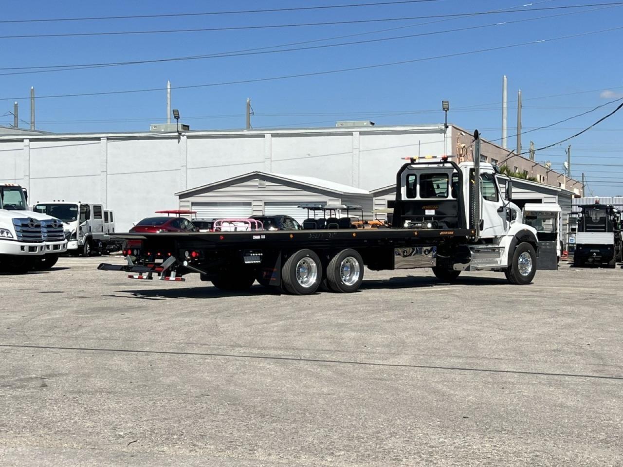 2025 Western Star 47X Jerr-Dan 28' 15-Ton Industrial Carrier Truck