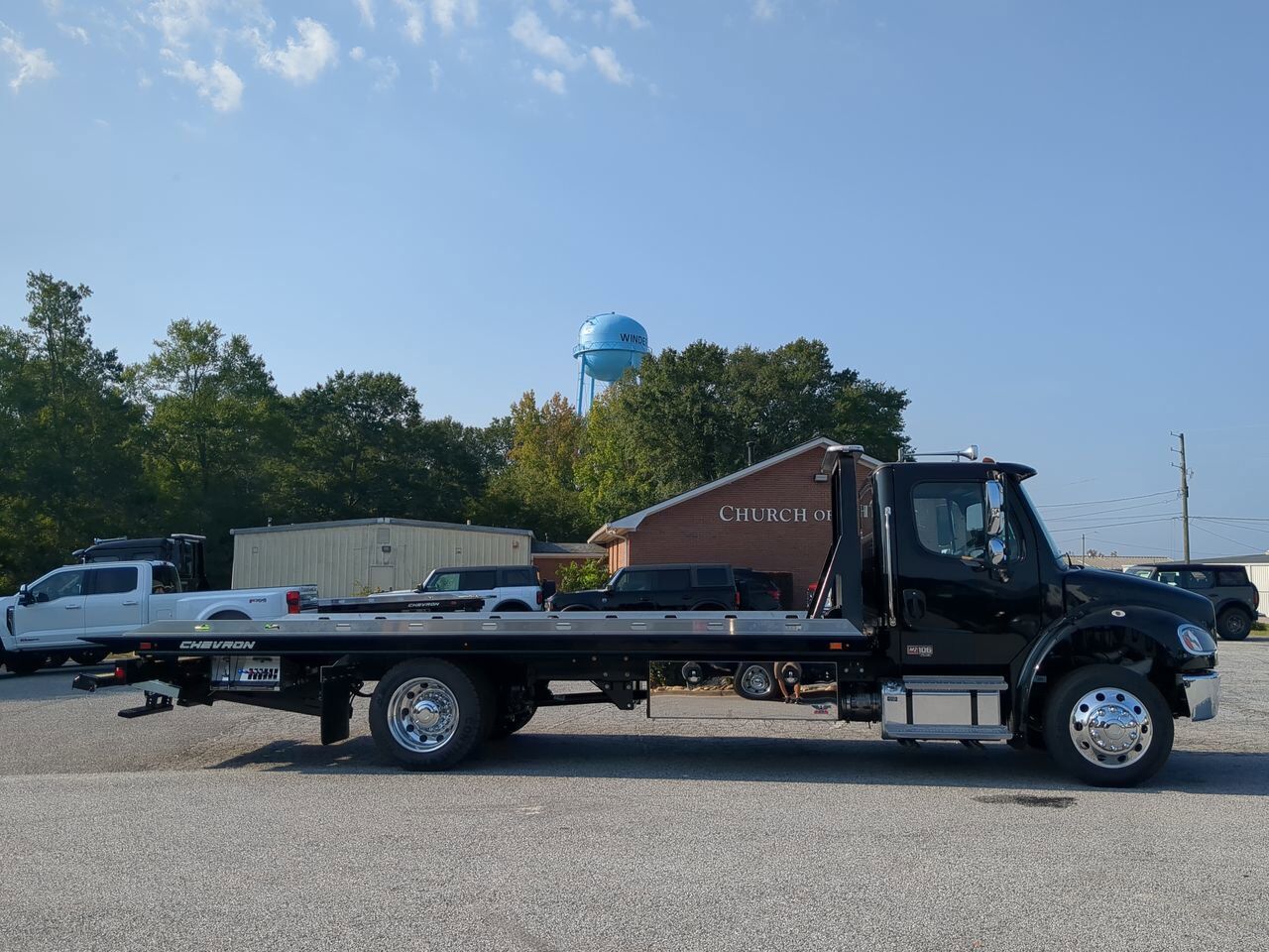 2026 Freightliner M2 equipped with 21.5ft Chevron LCG Rollback Winder GA