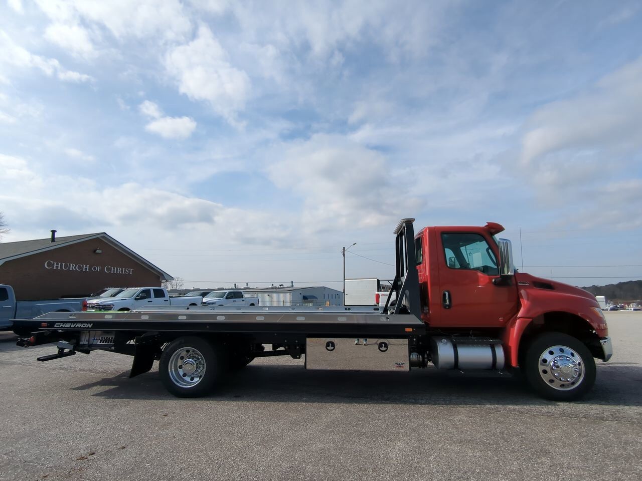 2026 International MV607 equipped with 21.5ft Chevron LCG Rollback Winder GA