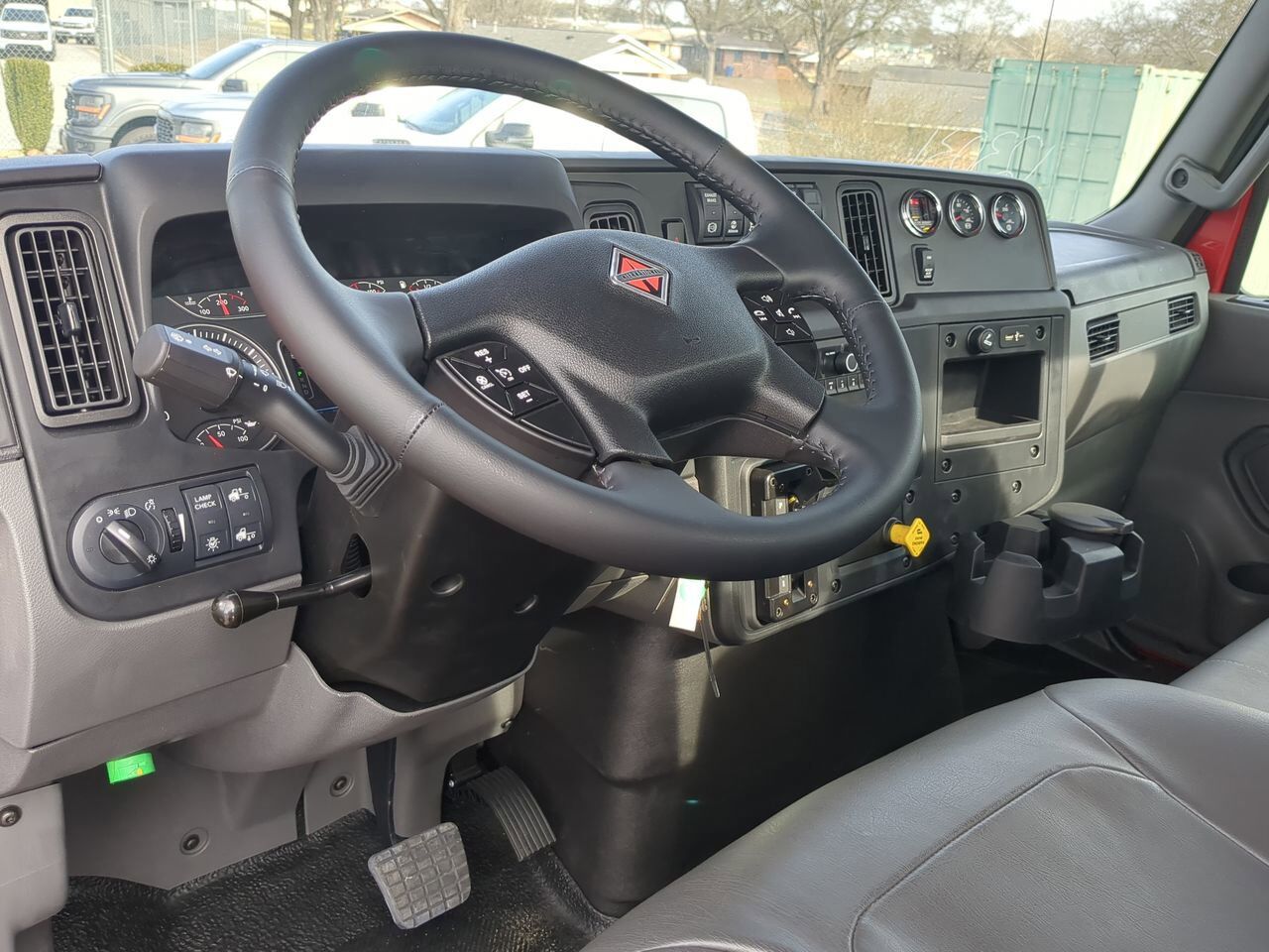 2026 International MV607 equipped with 21.5ft Chevron LCG Rollback Winder GA