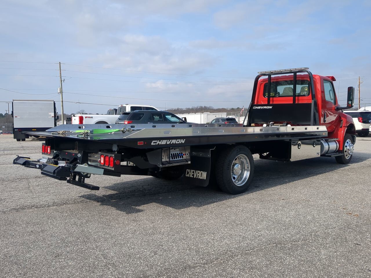 2026 International MV607 equipped with 21.5ft Chevron LCG Rollback Winder GA