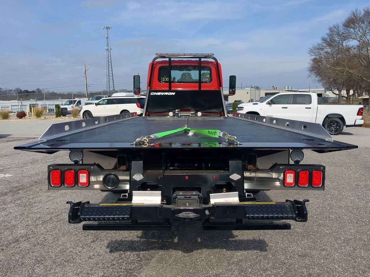 2026 International MV607 equipped with 21.5ft Chevron LCG Rollback Winder GA