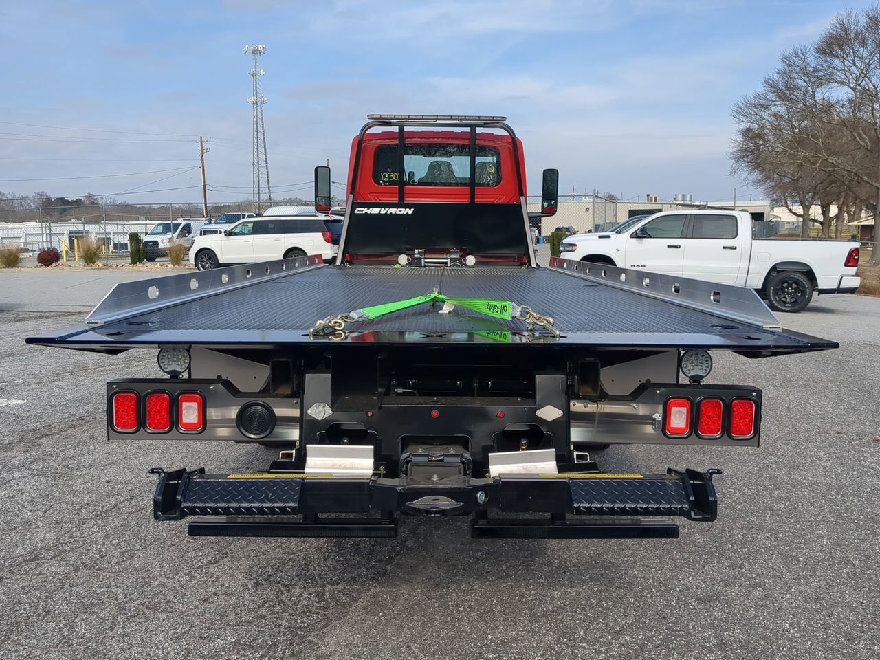 2026 International MV607 equipped with 21.5ft Chevron LCG Rollback Winder GA