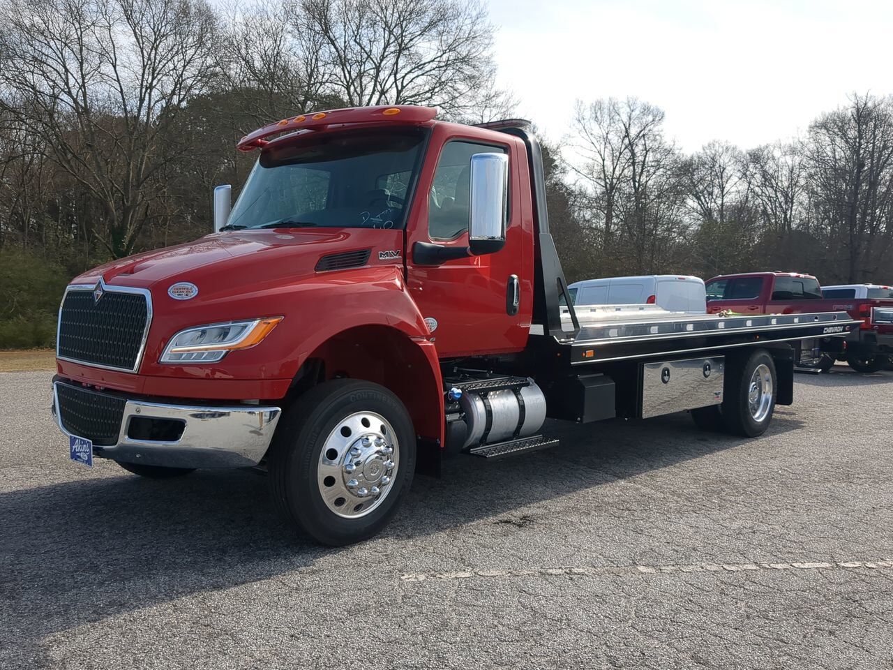 2026 International MV607 equipped with 21.5ft Chevron LCG Rollback Winder GA