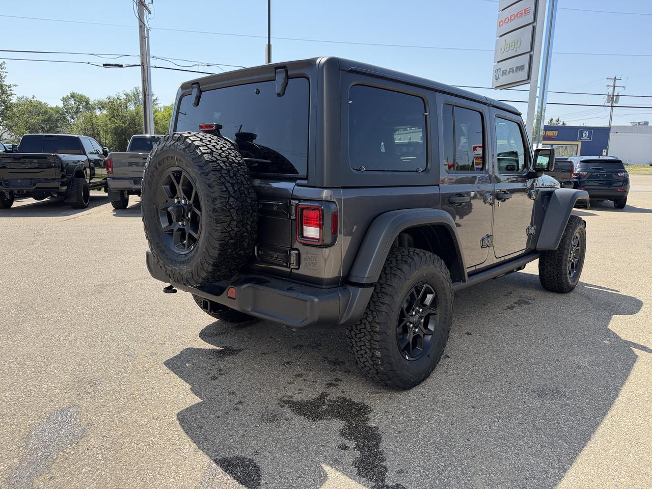 2026 Jeep Wrangler Willys 4 Door 4x4 | 33IN Off Road Tires | Uconnect 5 | Off Road Plus Mode | V6 Engine Redwater AB