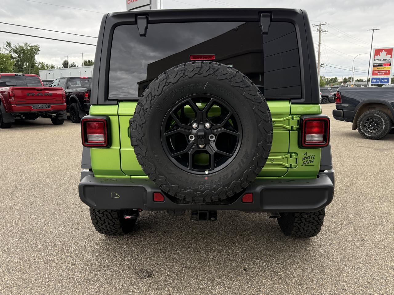 2026 Jeep Wrangler Willys 4x4 | V6 Pentastar | Mojito | Black Leather | Black Freedom 3 Piece Hardtop | 12IN Display Redwater AB