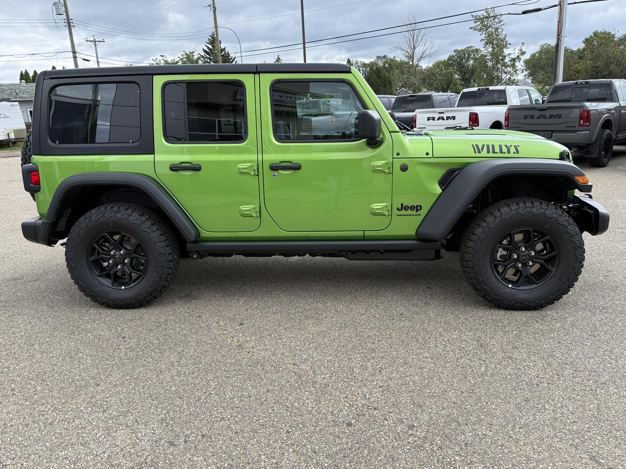 2026 Jeep Wrangler Willys 4x4 | V6 Pentastar | Mojito | Black Leather | Black Freedom 3 Piece Hardtop | 12IN Display Redwater AB