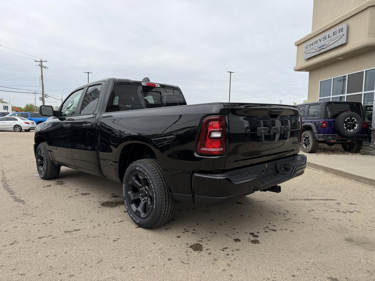 2026 Ram 1500 Express Quad Cab 4x4 | V6 eTorque | 20IN Wheels | Remote Start | Backup Camera | Towing Capability Redwater AB