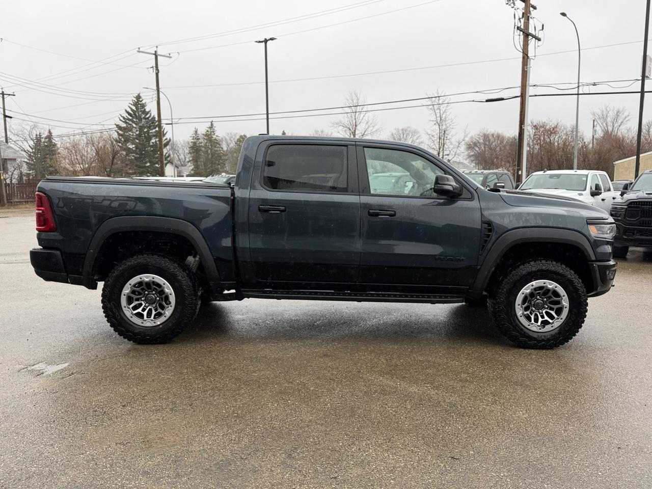 2026 Ram 1500 RHO Crew Cab 4x4 | 3L Hurricane | 35IN Tires | 12IN Display | NAV | Heated Leather Suede Seats Redwater AB