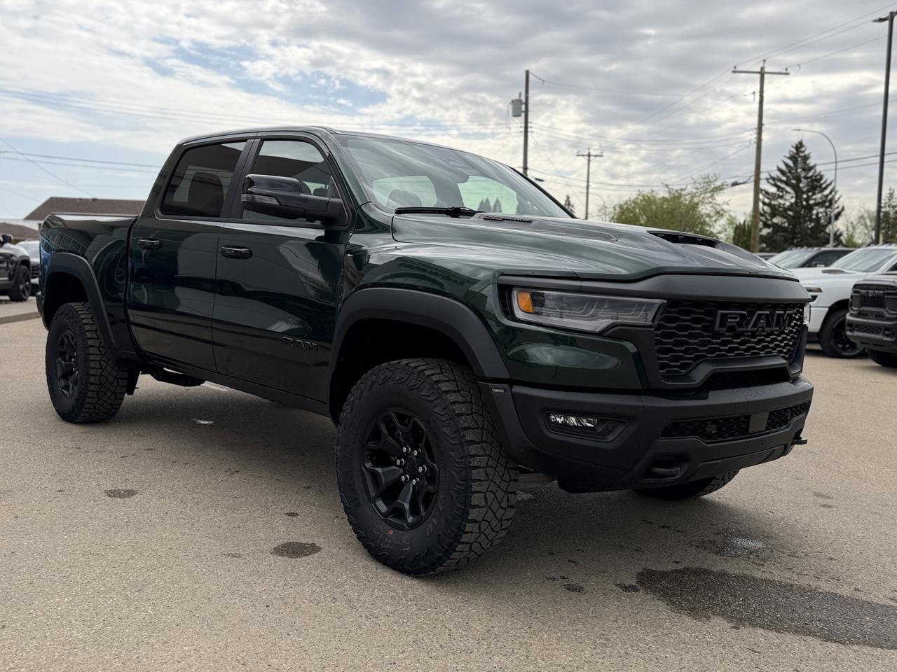 2026 Ram 1500 RHO Crew Cab 4x4 | Serrano Green | 3L Twin Turbo | Black Leather | NAV | 12IN Display | Remote Start Redwater AB
