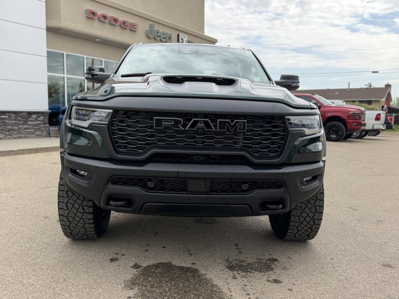 2026 Ram 1500 RHO Crew Cab 4x4 | Serrano Green | 3L Twin Turbo | Black Leather | NAV | 12IN Display | Remote Start Redwater AB