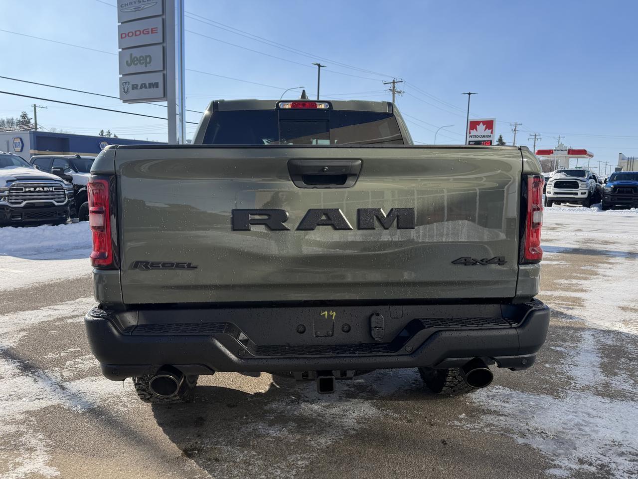 2026 Ram 1500 Rebel Crew Cab 4x4 | 3L Hurricane | Canyon Lake | 12IN Touchscreen | NAV | Remote Start | Sport Hood Redwater AB
