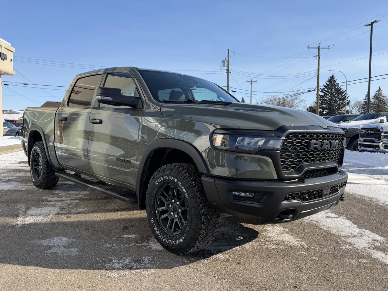2026 Ram 1500 Rebel Crew Cab 4x4 | 3L Hurricane | Canyon Lake | 12IN Touchscreen | NAV | Remote Start | Sport Hood Redwater AB