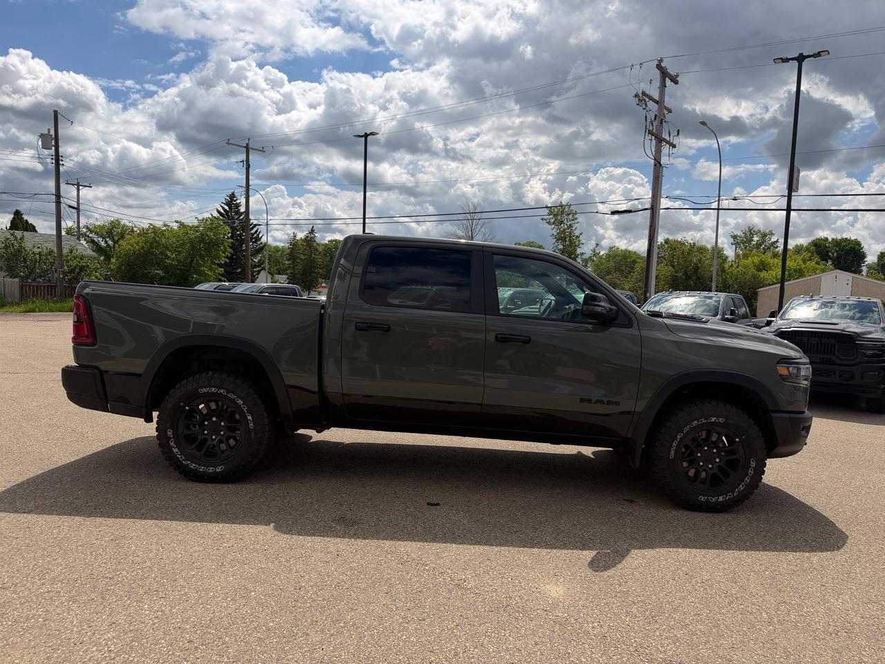 2026 Ram 1500 Rebel Crew Cab 4x4 | 3L Hurricane | Canyon Lake | Heated Vented Black Leather | NAV | Pano Sunroof Redwater AB