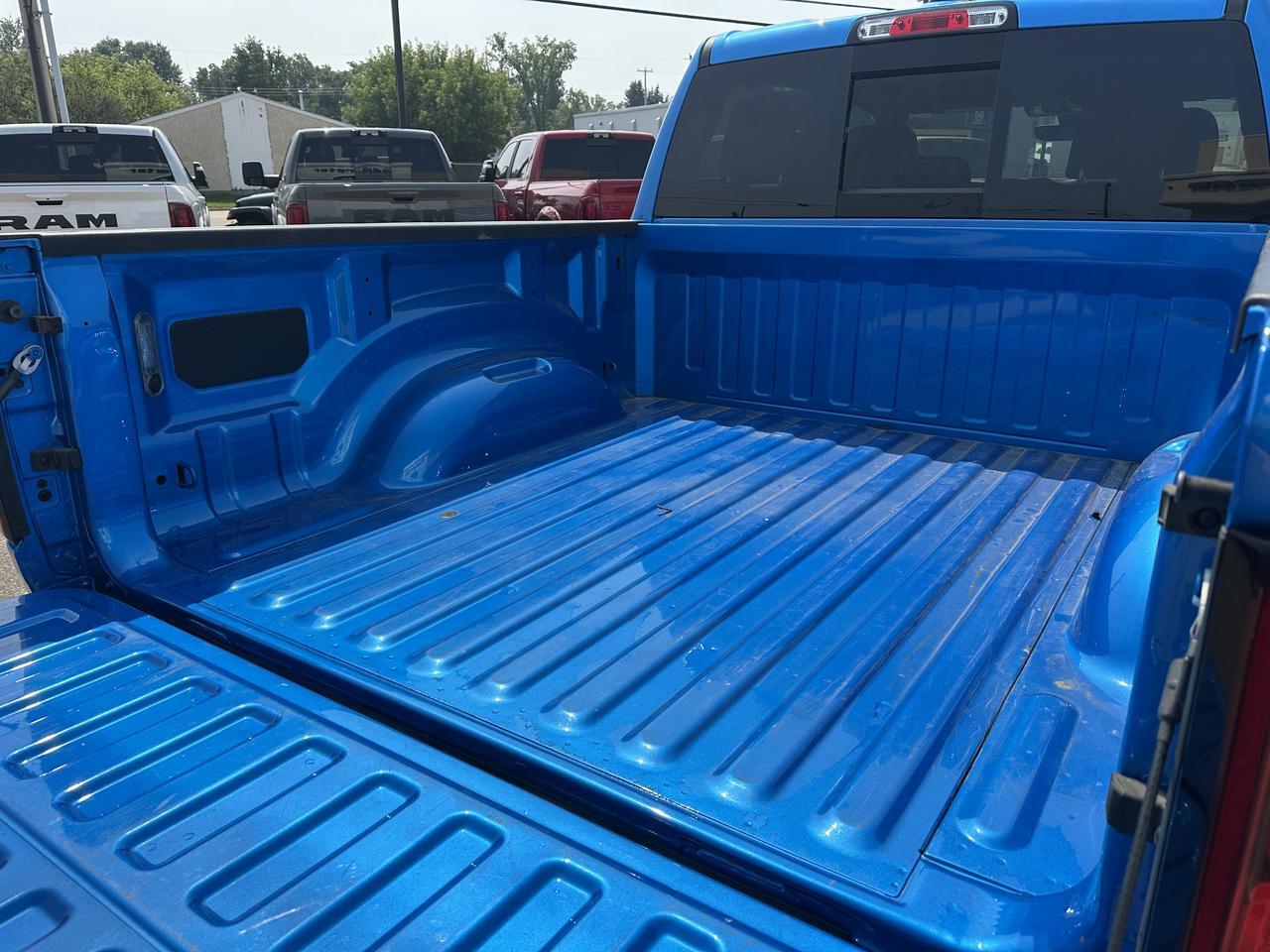 2026 Ram 1500 Rebel Crew Cab 4x4 | 3L Hurricane | Low KMs | Hydro Blue | NAV | 12IN Display | Heated Front Seats Redwater AB