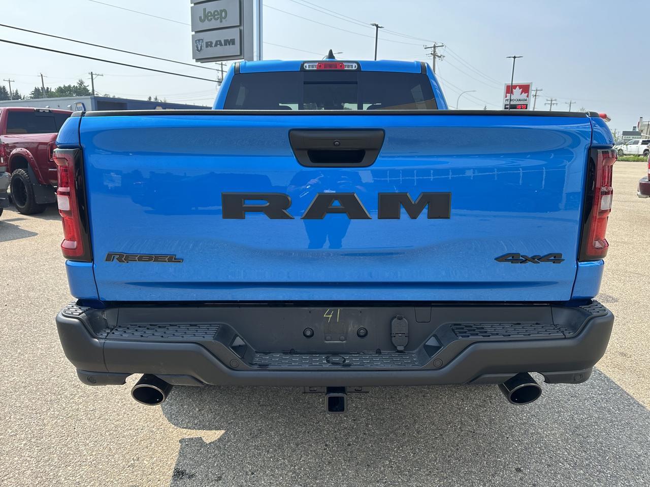2026 Ram 1500 Rebel Crew Cab 4x4 | 3L Hurricane | Low KMs | Hydro Blue | NAV | 12IN Display | Heated Front Seats Redwater AB