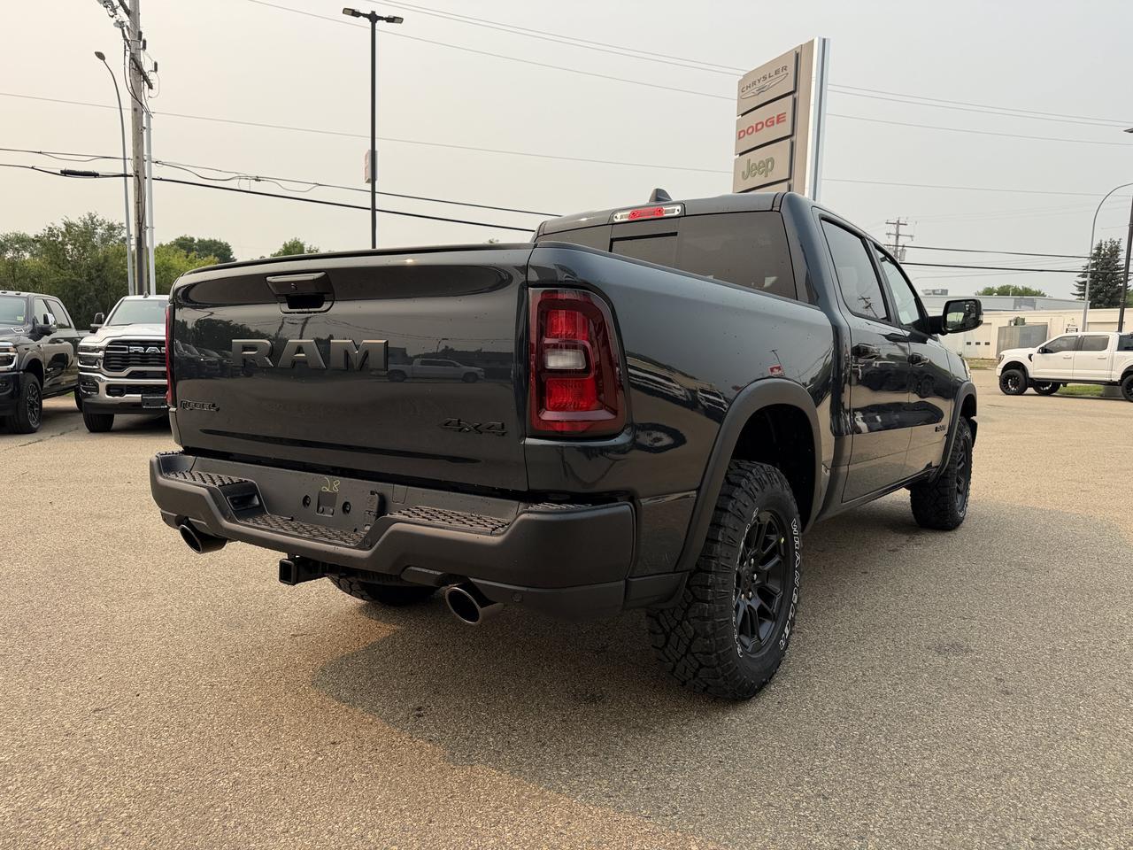 2026 Ram 1500 Rebel Crew Cab 4x4 | 3L Hurricane | Off-Road Suspension | AT Tires | Towing Package Redwater AB