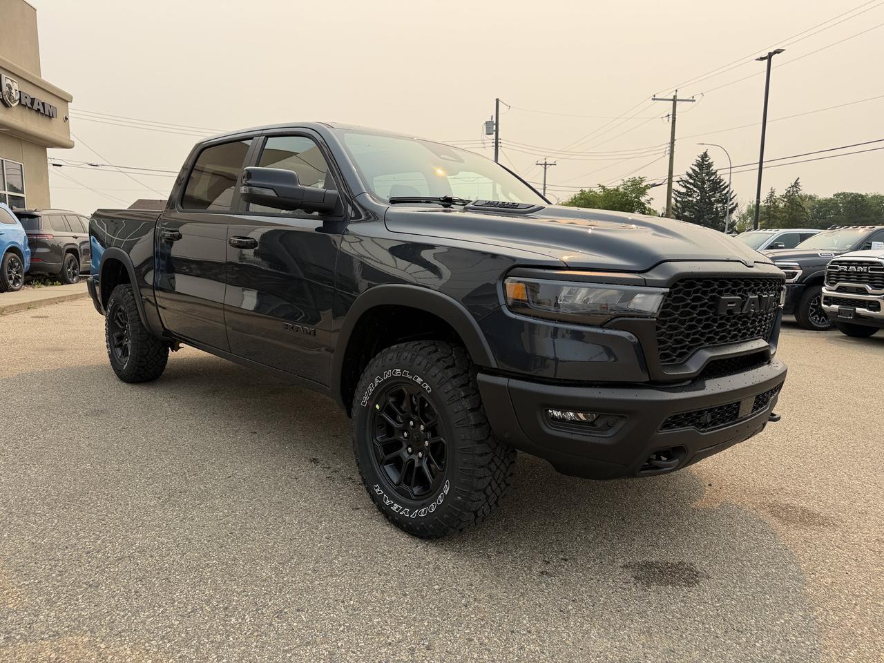 2026 Ram 1500 Rebel Crew Cab 4x4 | 3L Hurricane | Off-Road Suspension | AT Tires | Towing Package Redwater AB