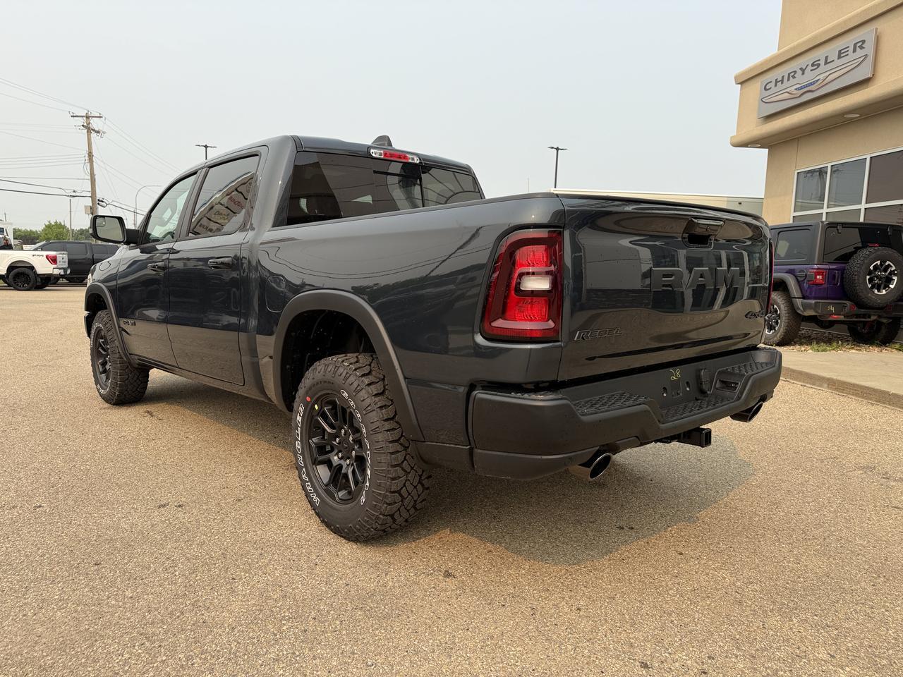 2026 Ram 1500 Rebel Crew Cab 4x4 | 3L Hurricane | Off-Road Suspension | AT Tires | Towing Package Redwater AB