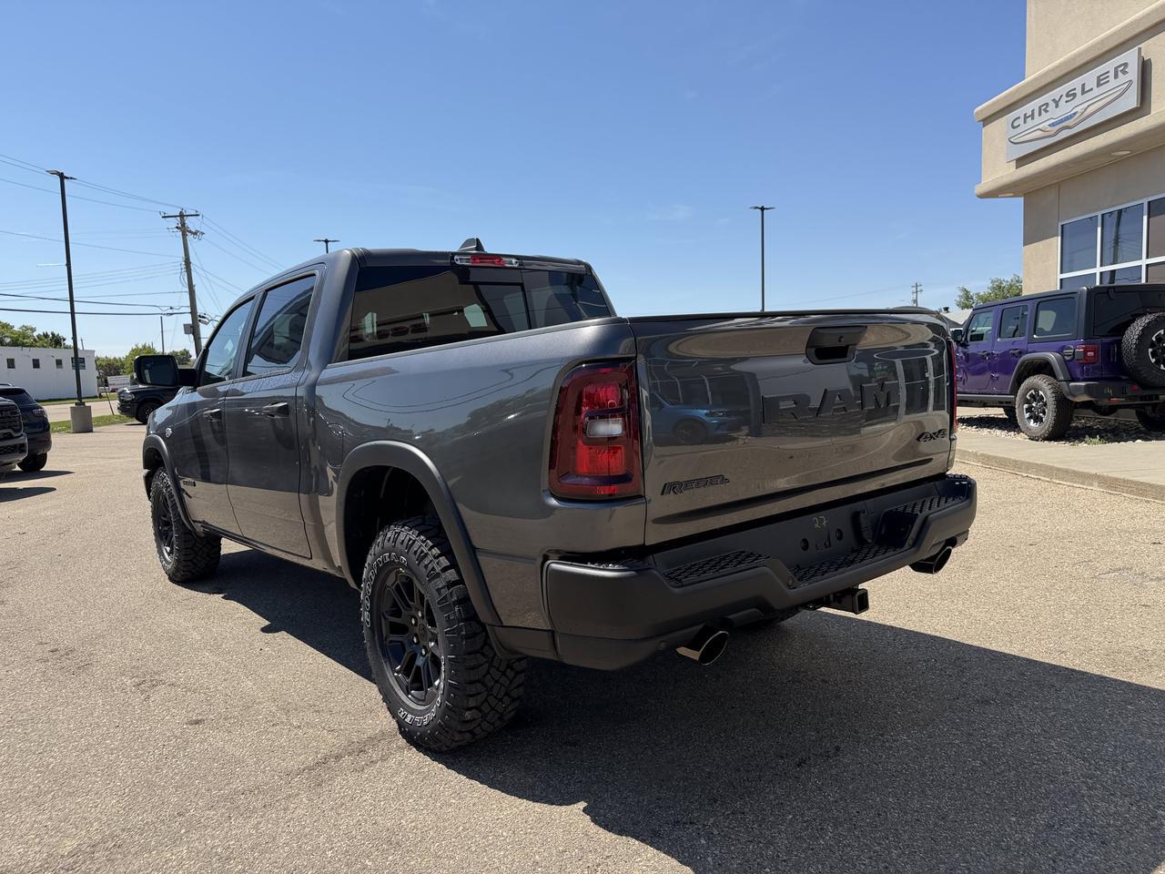 2026 Ram 1500 Rebel Crew Cab 4x4 | HEMI V8 | eTorque Hybrid | Black Red Interior | NAV | Heated Seats | Towing Redwater AB