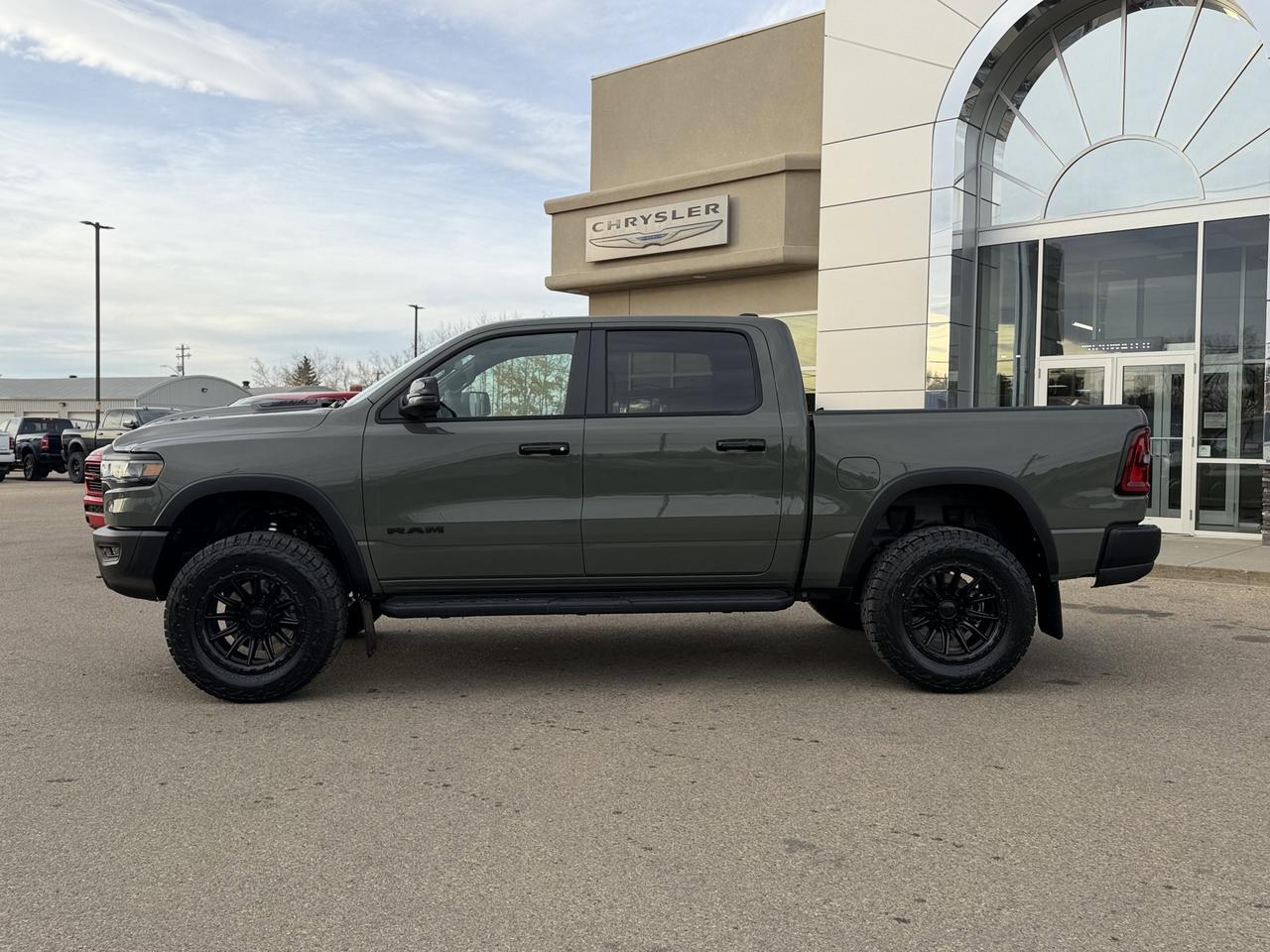 2026 Ram 1500 Rebel Crew Cab 4x4 | Rig Ready RAM - Shake n Bake | Leather | Pano Sunroof | NAV | Heated Vented Sea Redwater AB