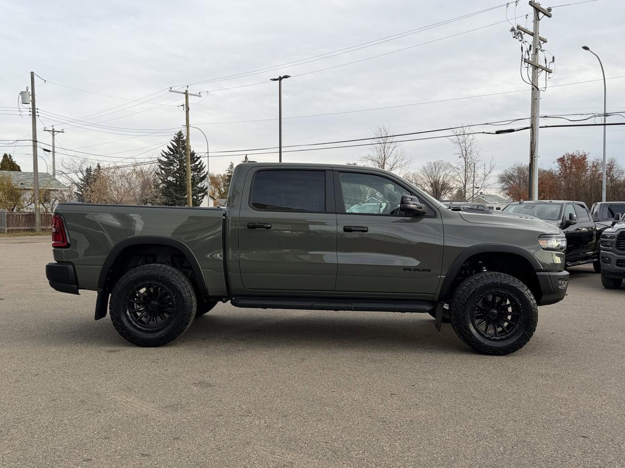 2026 Ram 1500 Rebel Crew Cab 4x4 | Rig Ready RAM - Shake n Bake | Leather | Pano Sunroof | NAV | Heated Vented Sea Redwater AB