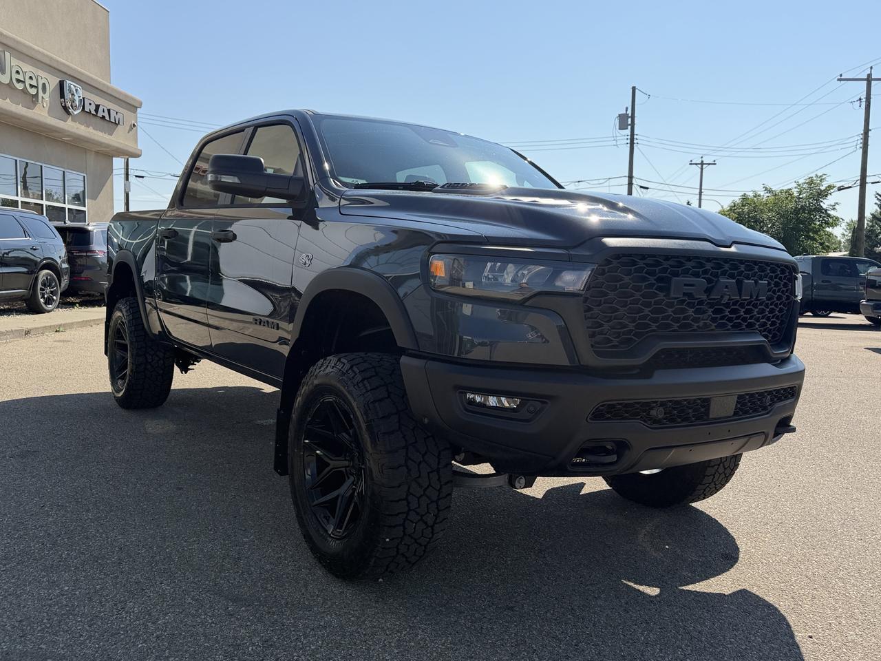 2026 Ram 1500 Rebel Crew Cab 4x4 | Rig Ready Ram | PATRICK | Hemi | 6" Lift Kit | 20" Rims | 35" Tires Redwater AB