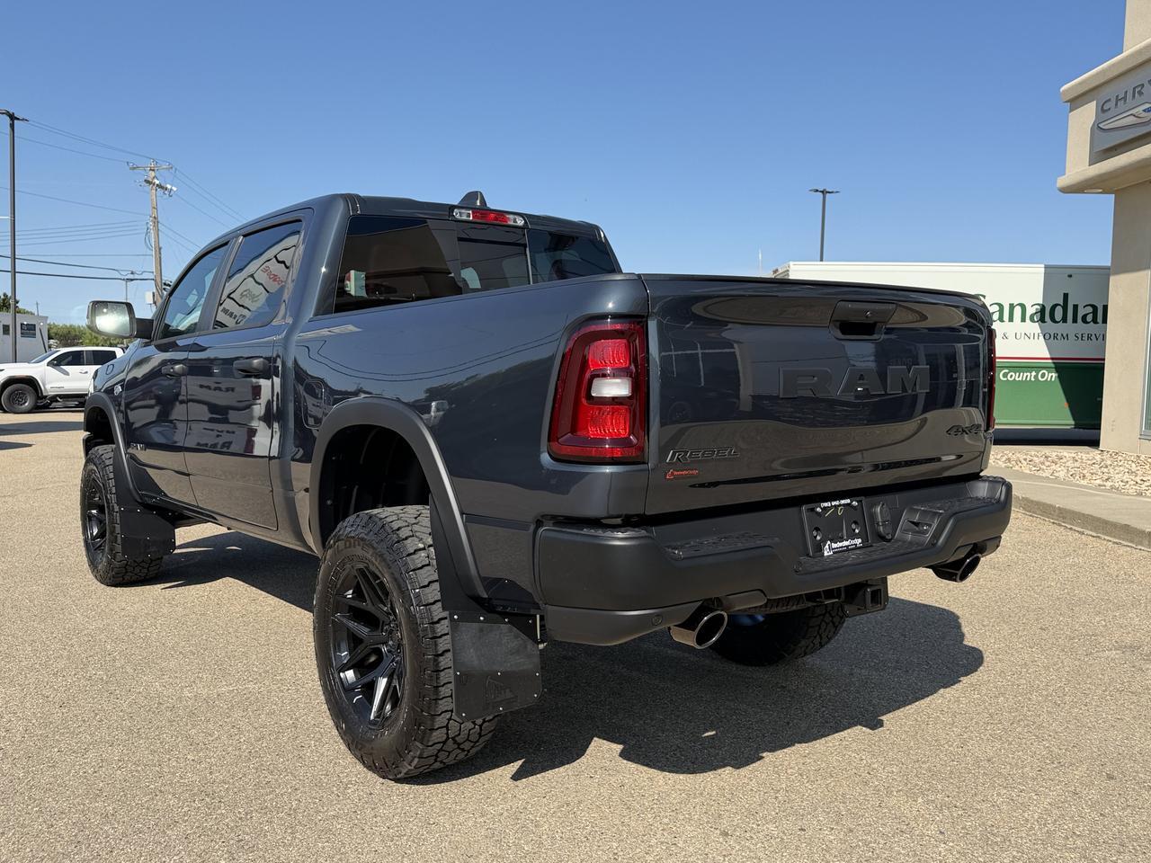 2026 Ram 1500 Rebel Crew Cab 4x4 | Rig Ready Ram | PATRICK | Hemi | 6" Lift Kit | 20" Rims | 35" Tires Redwater AB