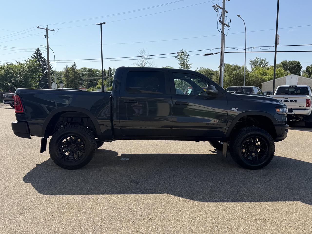 2026 Ram 1500 Rebel Crew Cab 4x4 | Rig Ready Ram | PATRICK | Hemi | 6" Lift Kit | 20" Rims | 35" Tires Redwater AB