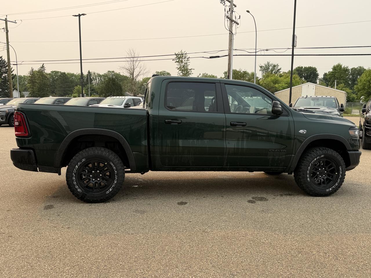 2026 Ram 1500 Rebel Crew Cab 4x4 | Serrano Green | NAV | Panoramic Sunroof | Luxury Leather | Heated Vented Redwater AB