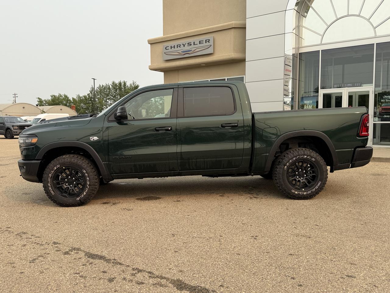 2026 Ram 1500 Rebel Crew Cab 4x4 | Serrano Green | NAV | Panoramic Sunroof | Luxury Leather | Heated Vented Redwater AB