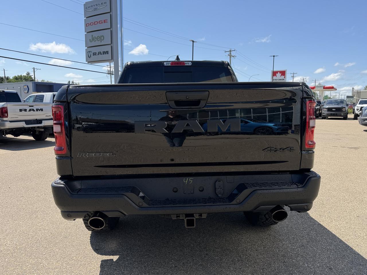 2026 Ram 1500 Rebel Crew Cab 4x4 | V8 Hybrid | 12IN Display | NAV | Backup Camera | Off-Road Suspension Redwater AB
