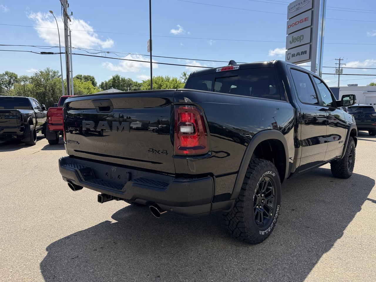 2026 Ram 1500 Rebel Crew Cab 4x4 | V8 Hybrid | 12IN Display | NAV | Backup Camera | Off-Road Suspension Redwater AB